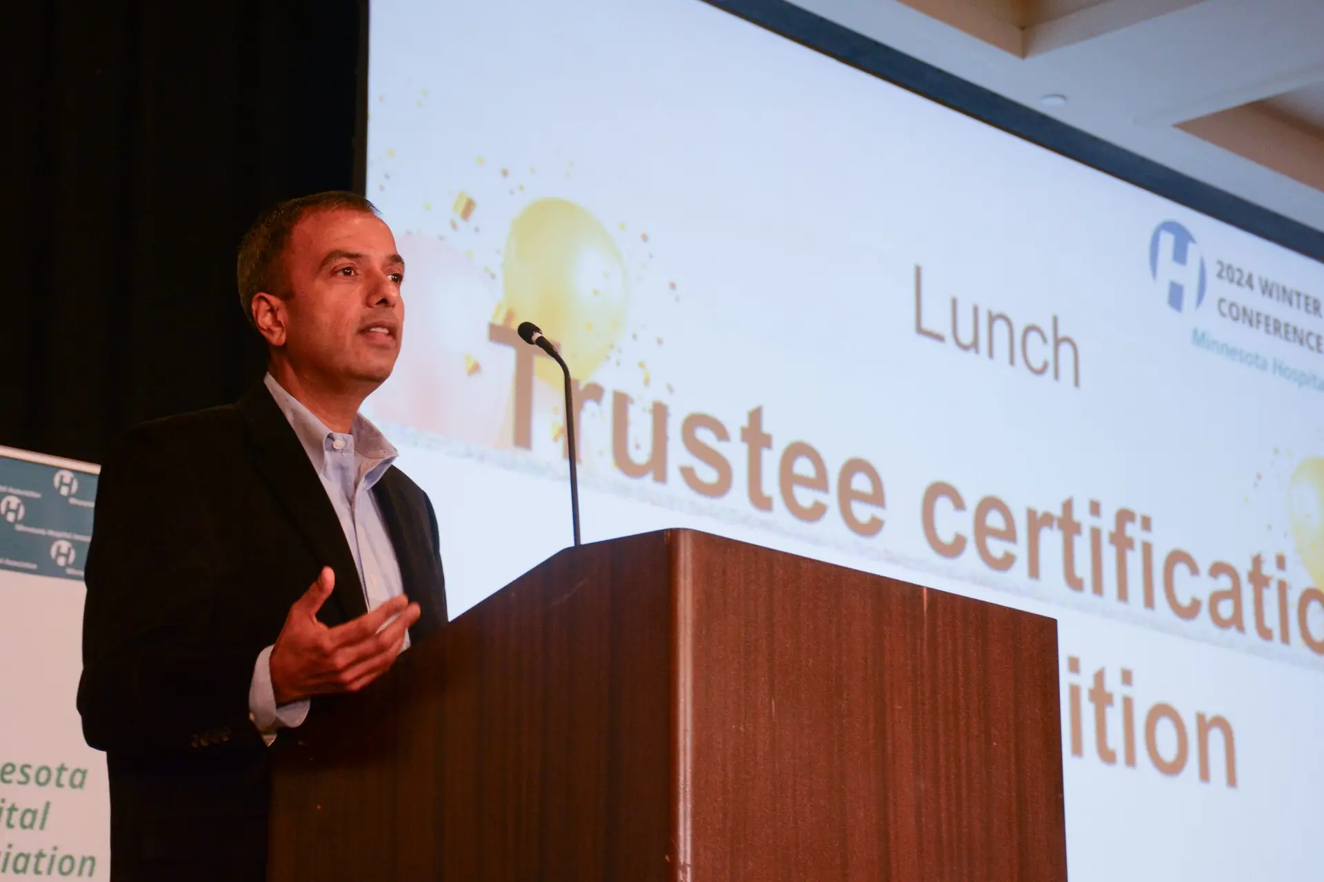 Man giving speech at a conference