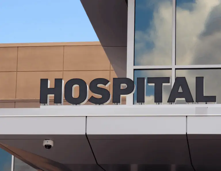 a sign on the front of a hospital