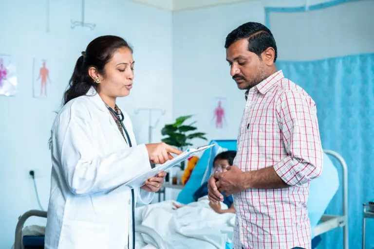 a doctor speaking to a patient