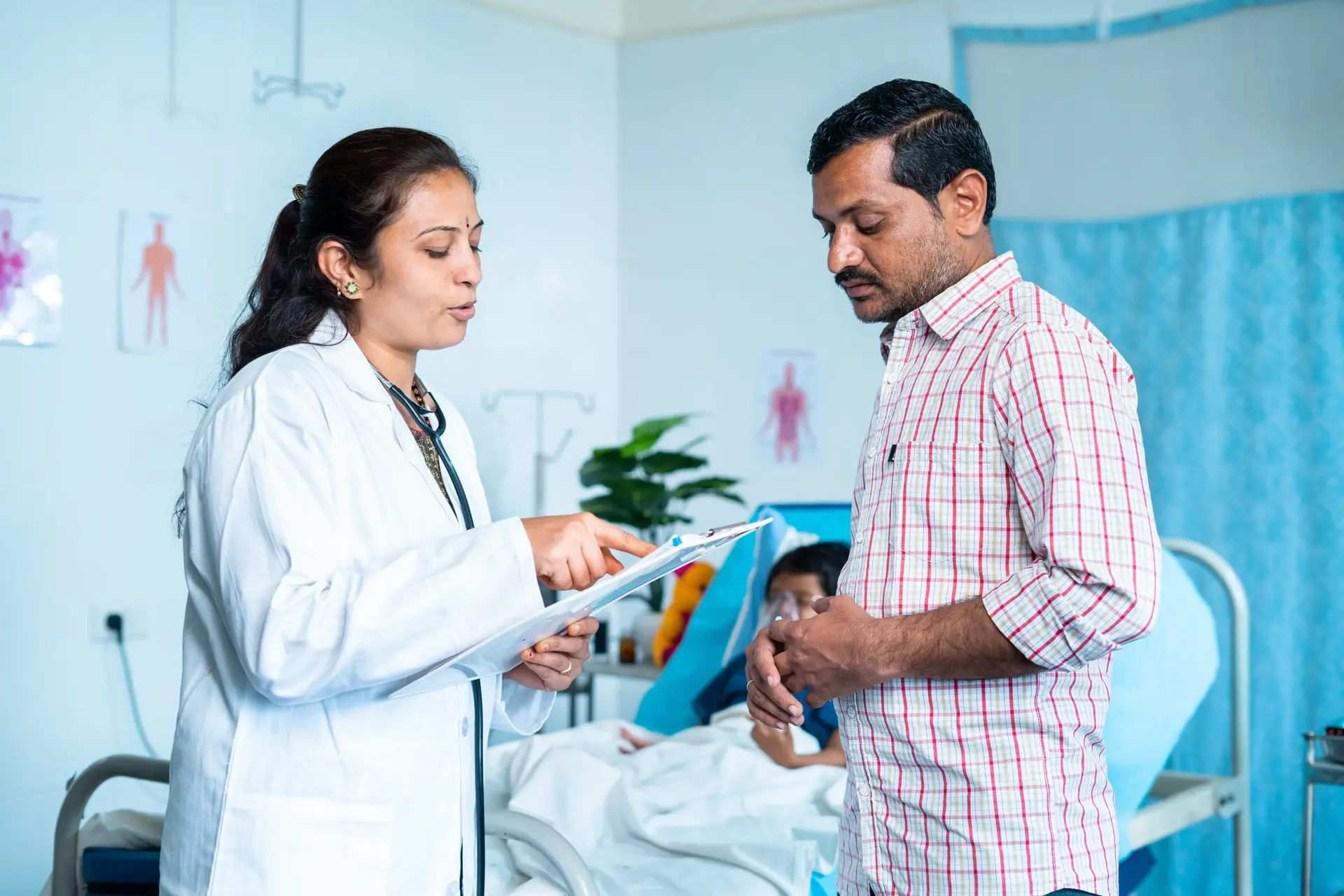 a doctor speaking to a patient