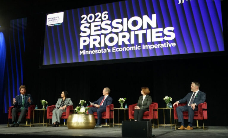 four panelists in front of a screen that says "2026 Session Priorities"