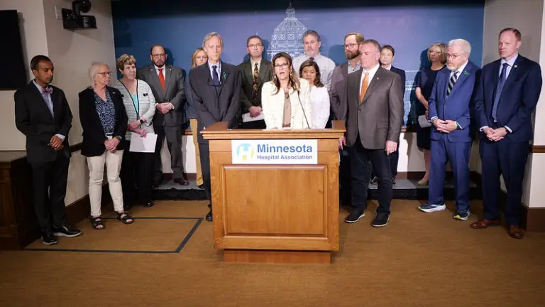 a group of people at a press conference