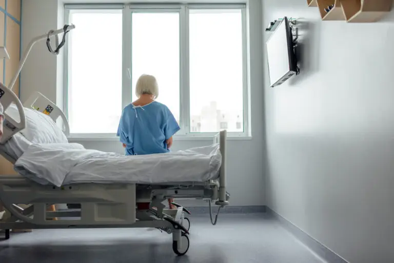 a patient sitting on a hospital bed